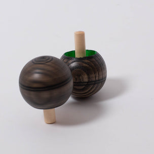 Turn over Spinning Top in grey with red or green | © Conscious Craft
