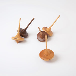 Ibis Spinning Tops in a variety of woods | Conscious Craft