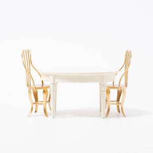 White dining table with gold chairs for Maileg mouse | © Conscious Craft