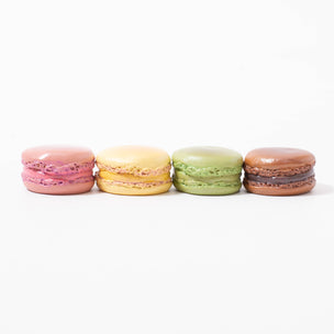 Four different coloured/flavoured resin macarons from Maileg © Conscious Craft