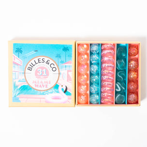 Mini box of Miami Wave marbles in peach pink turquoise clear from Billes & Co | © Conscious Craft