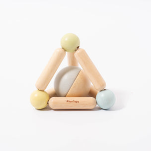 Plan Toys Triangle Clutching Toy | Pastel | © Conscious Craft